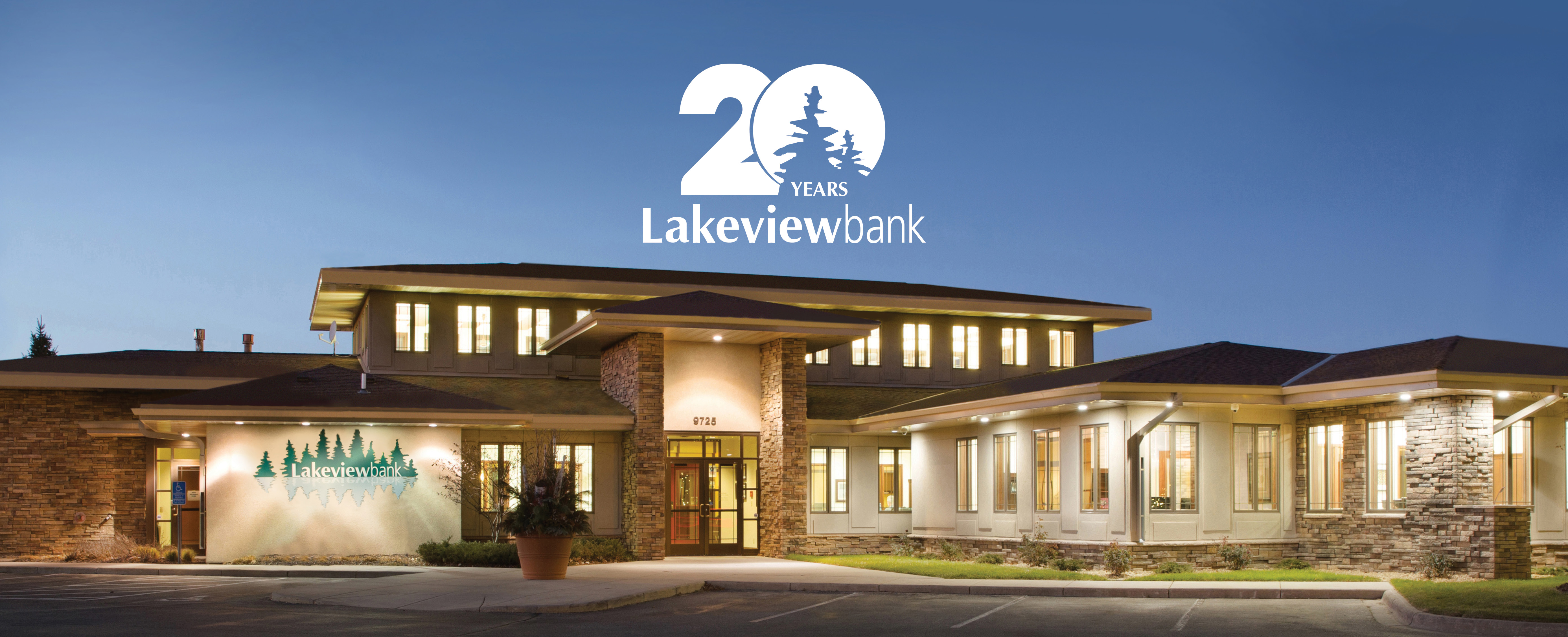 Image of Lakeview Bank with image of 20 year logo above it.